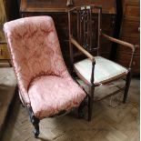 A Victorian carved mahogany nursing chair and inlaid Edwardian elbow chair