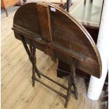 An Edwardian oak and mahogany campaign table