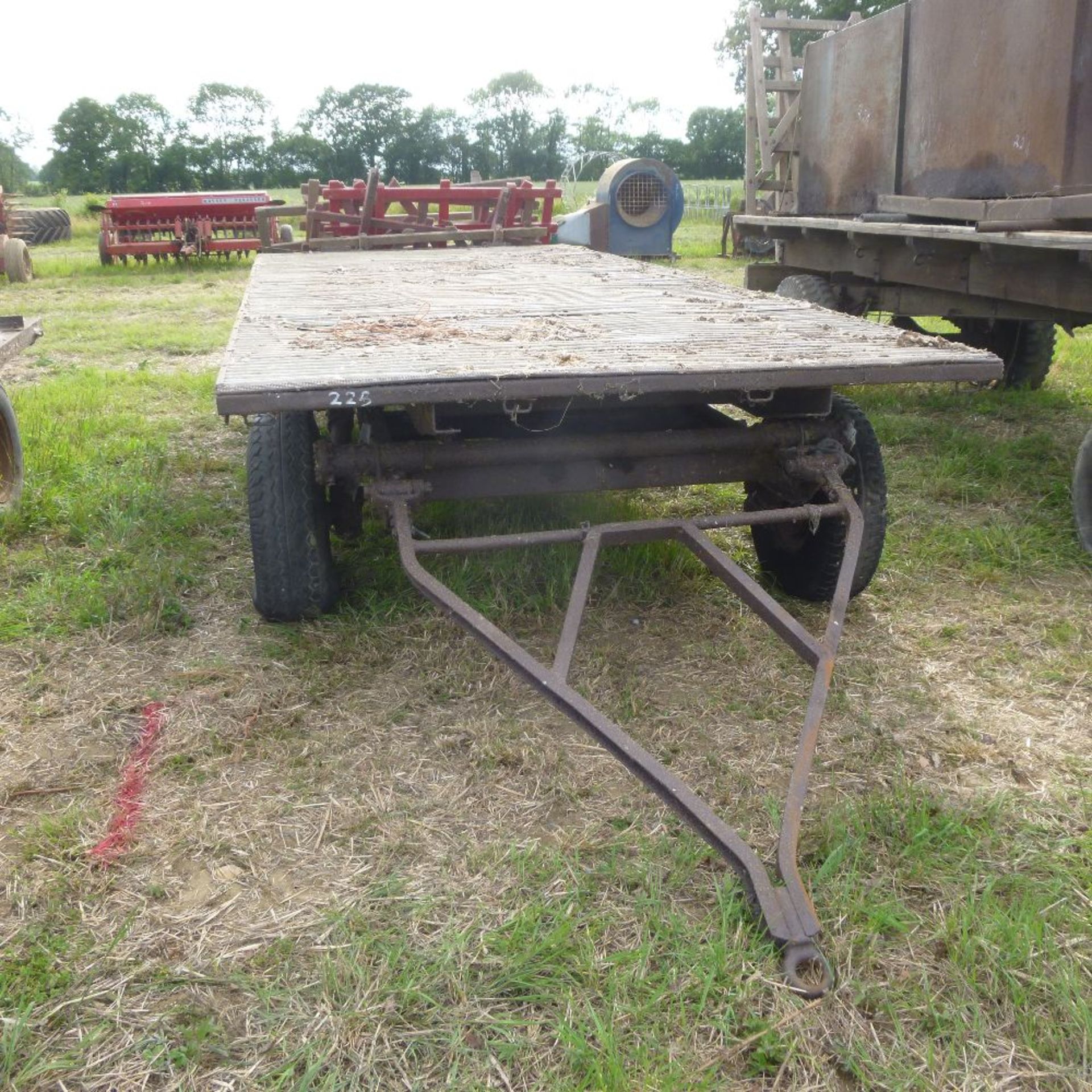 4 wheel straw trailer with corrugated metal floor