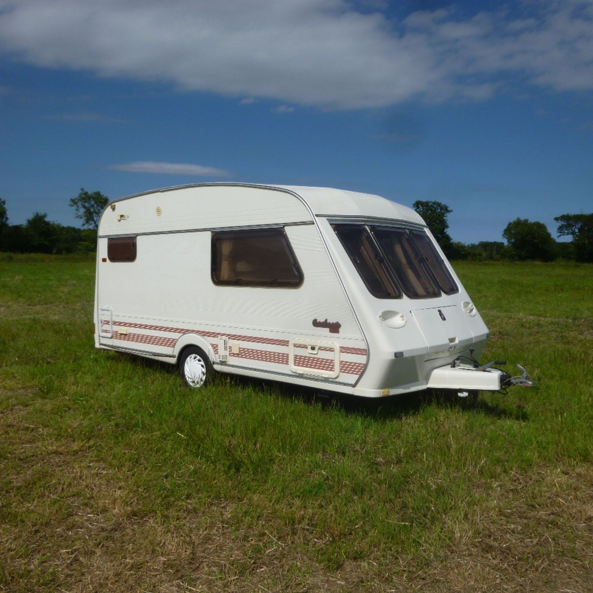 Caravan including two awnings and gas bottles