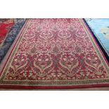 A machine made Persian pattern floral carpet,