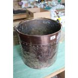 A 19th Century Dutch riveted copper log bucket with embossed country scene,