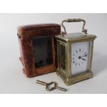 A cased French brass carriage clock