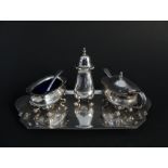 A silver plated cruet set,