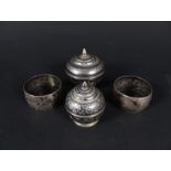 Two silver Niello decorated lidded pots and two silver Niello decorated napkin rings