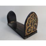 A Victorian rosewood and brass adjustable book rack