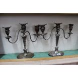 A pair of 19th Century Adam style three light silver plated on copper candelabra with reeded