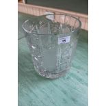 A heavy cut glass ice bucket