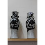 A pair of Chinese crackle ware vases with relief dragon decoration,