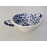 A 17th Century Delft blue and white bleeding bowl (as found)