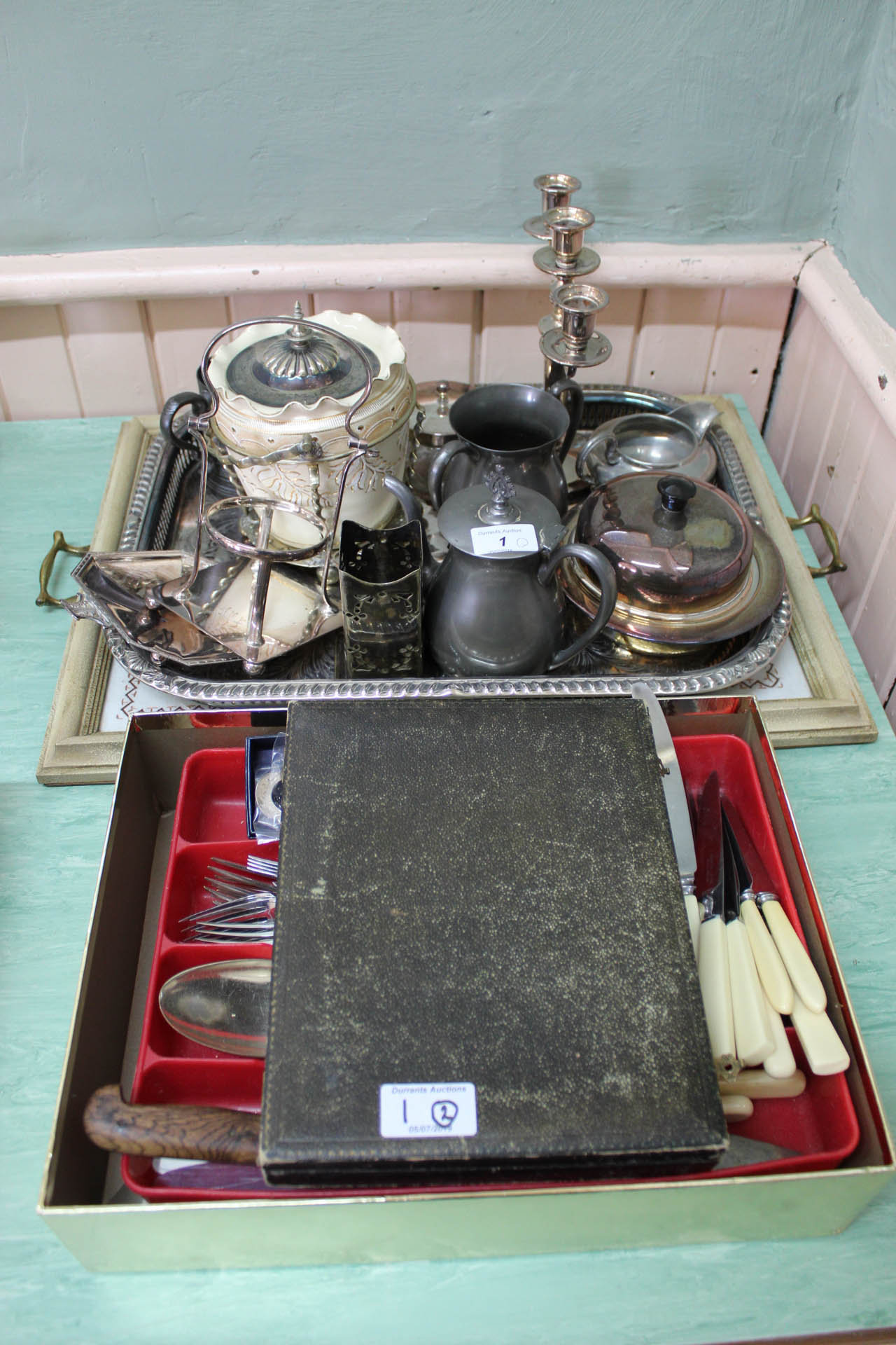 A silver plated tray and tea tray containing silver plate,