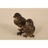 A cold painted Vienna bronze of two chicks,