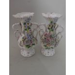 A pair of 19th Century Rockingham style floral encrusted vases (as found)