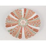 A 19th Century Imari frill edged floral plate,
