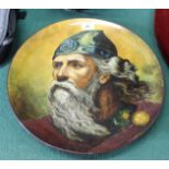 A Doulton Lambeth pottery wall plate of a bearded warrior, E.S.G.