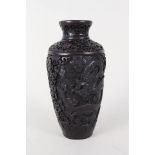 A Chinese cast moulded vase with relief dragon decoration,