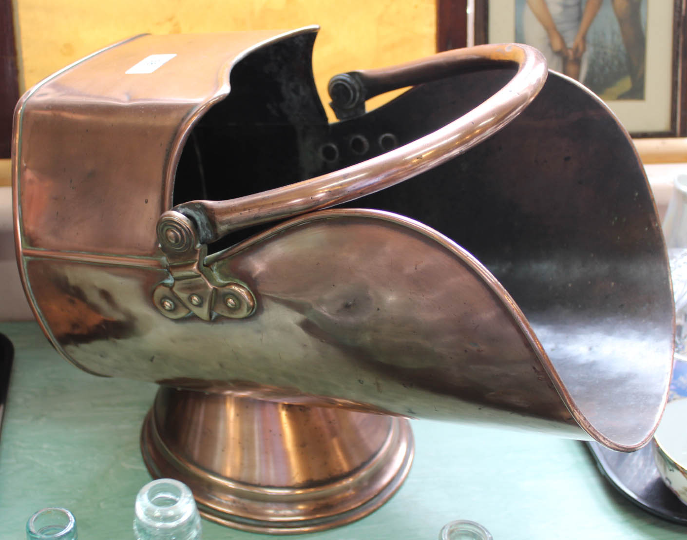 A heavy 19th Century copper coal scuttle with swing and fixed handles