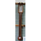 An inlaid mahogany stick barometer with parallel gauges