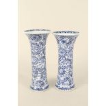 A pair of 19th Century Chinese blue and white floral flared neck vases,