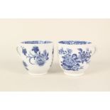 A pair of 18th Century blue and white floral cups