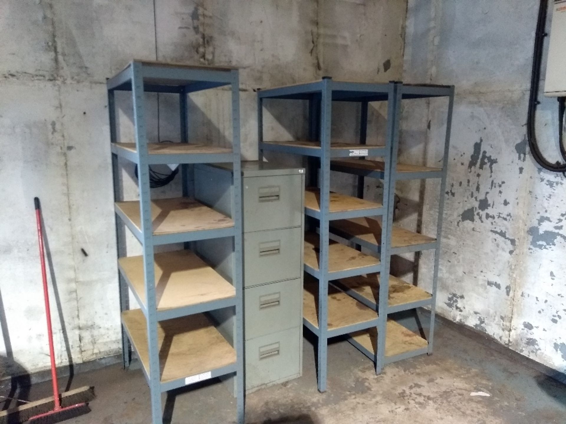 Metal shelving units and a filing cabinet. No VAT on this item.