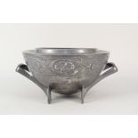 An English Art Nouveau pewter two handled bowl,