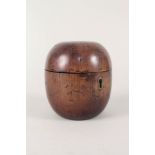 A 19th Century treen apple shaped tea caddy (missing stalk)