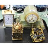 An onyx striking mantel clock,