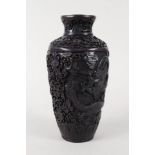 A Chinese cast moulded vase with relief dragon decoration,