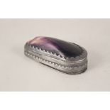 A pewter and shell snuff box