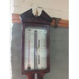 A 19th Century inlaid mahogany stick barometer by Barelli,