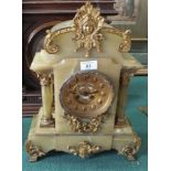 A French green marble and gilt metal striking mantel clock