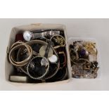 Two boxes of mixed costume jewellery including necklaces, earrings,