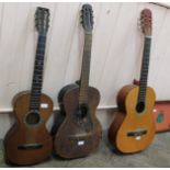 Two Spanish guitars (one as found) plus one other