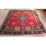 A Persian carpet with multiple geometric designs,