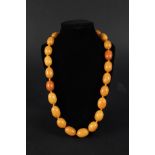 An amber butterscotch colour bead necklace