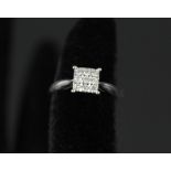 A 9ct white gold diamond panel ring,