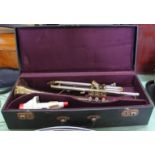 A cased Boosey & Hawkes 'Regent' brass trumpet