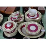 A Japanese maroon and gilt part dinner and tea set