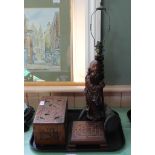 A Chinese carved camphor wood box, figural table lamp,