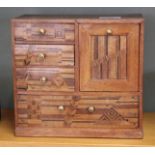 A Japanese marquetry table cabinet plus a Victorian walnut box with copper sphinx head mount