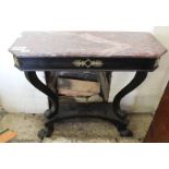 A 19th Century ebonised marble top console table with gilt detailing