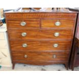 A Regency chest of five drawers on splayed feet