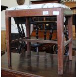 An early Victorian mahogany stretcher stool