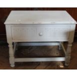 A painted oak low stretcher table with single drawer