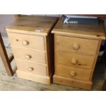 A pair of modern three drawer pine bedsides