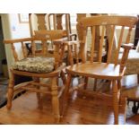 A modern beech Captain's chair and modern beech armchair