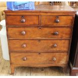 A Victorian mahogany cut chest of five drawers with original mahogany knobs