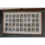 Two frames containing Wix Henry cigarette cards