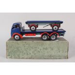 A boxed Shackleton blue and red Foden truck and open trailer (largely complete but missing three